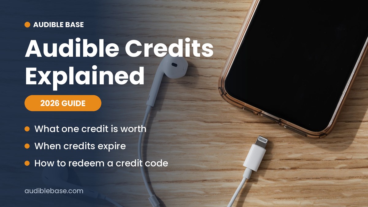 Audible credits explained 2026 guide – smartphone and earphones on a wooden desk